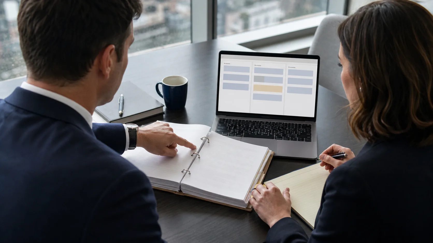 Two lawyers comparing organized AI review candidates with an original source binder